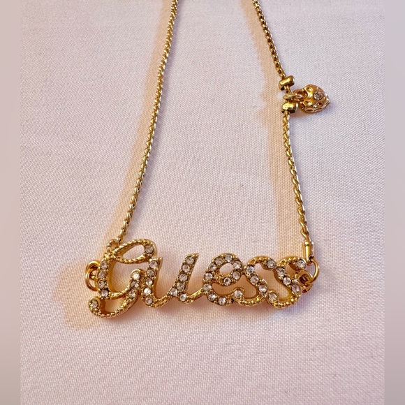 Adjustable GUESS Gold Slider Bracelet with Heart Charm and Crystal Accents - Picture 2 of 3